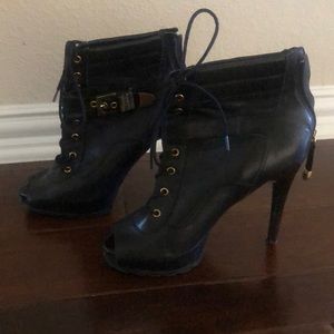 Beautiful black size 9 heel boots